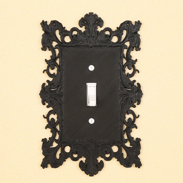 Dark carved switch frame