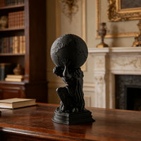 Dark Atlas skeleton sculpture