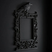 Dark raven-shaped photo frame