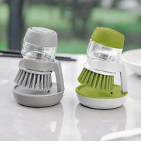 Soap-dispensing dish brush