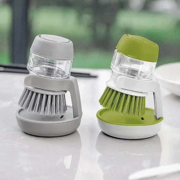 Soap-dispensing dish brush