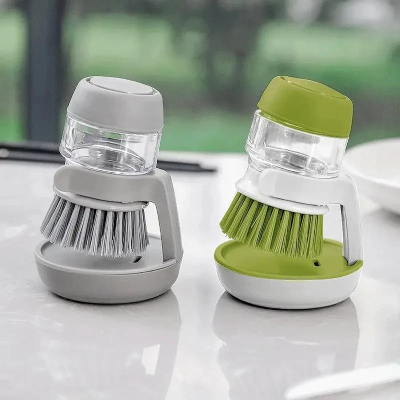 Soap-dispensing dish brush