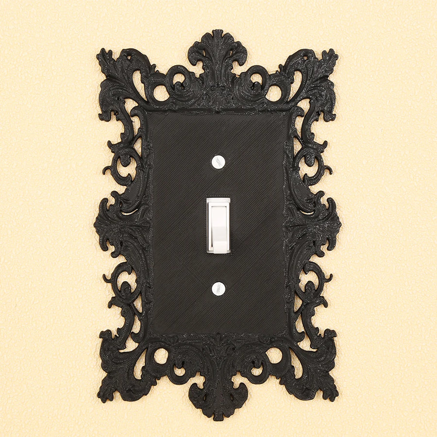 Dark carved switch frame