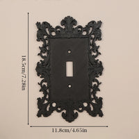 Dark carved switch frame